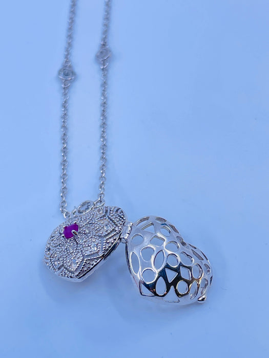 Sterling Silver pierced heart locket with Ruby