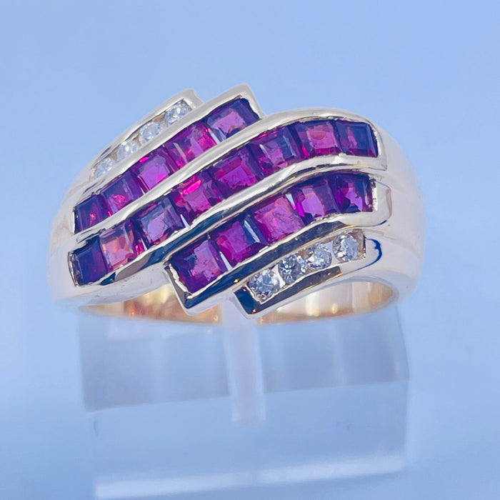 14kt Yellow Gold Ruby and Diamond bypass Ring