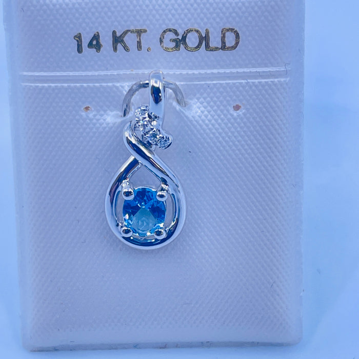 14kt White Gold .30ct Blue Topaz and Diamond Pendant