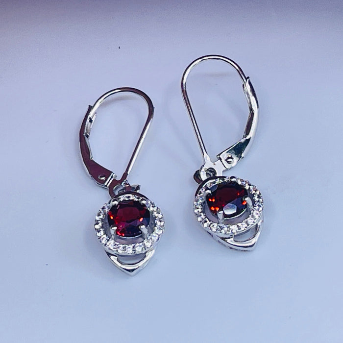 Sterling Silver Garnet Earrings with cz side stones