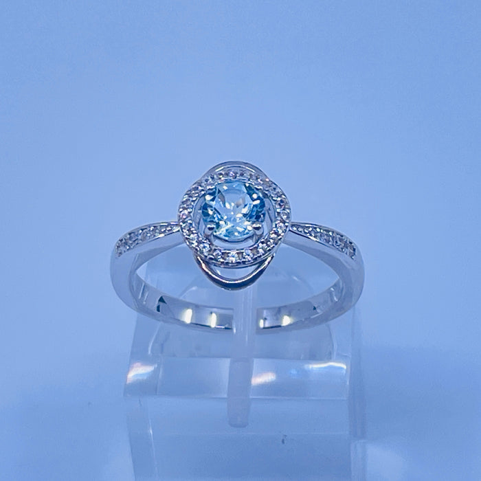 Sterling Silver lab aqua ring with cz side stones