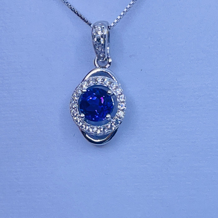 Sterling Silver Amethyst Pendant with cz side stones