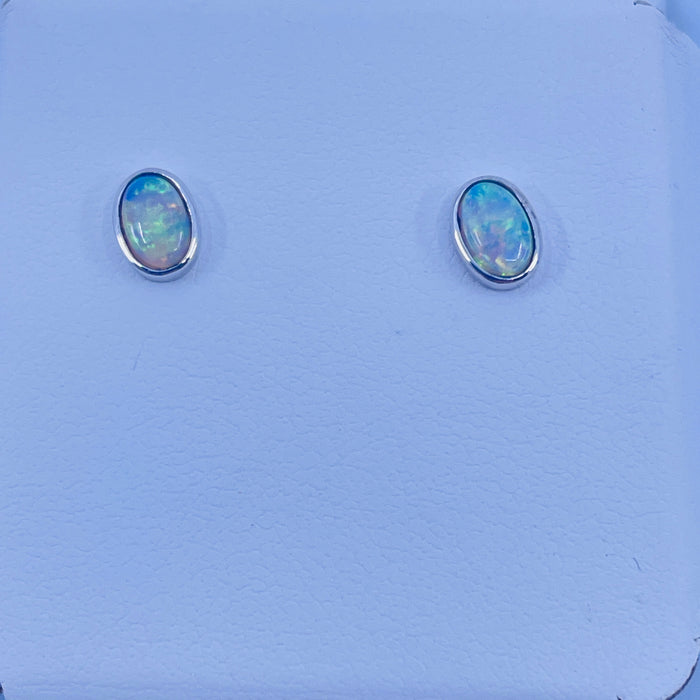 14kt White Gold bezel 4x6 stud Opal Earrings