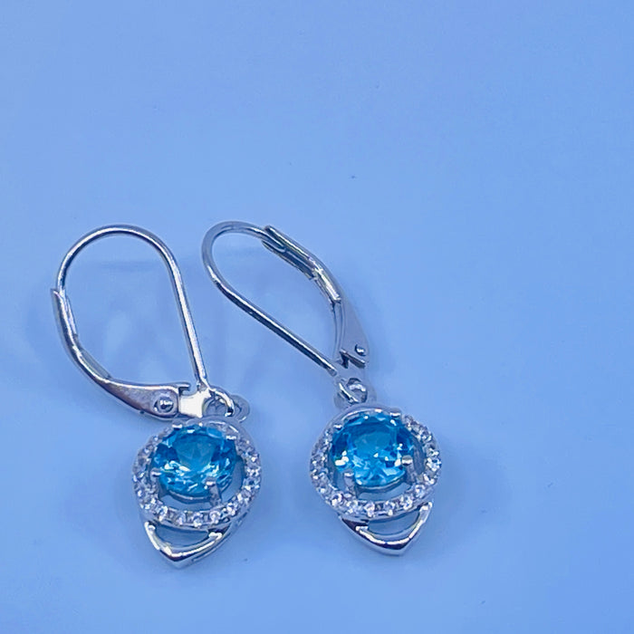 Sterling Silver Blue Topaz Earrings with cz side stones