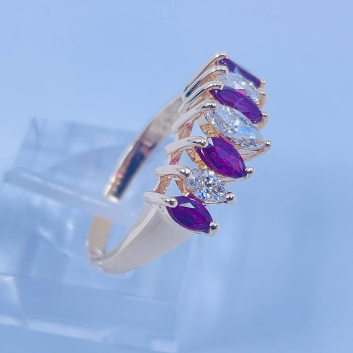 14kt Yellow Gold Marquise shaped Ruby and Diamond Ring