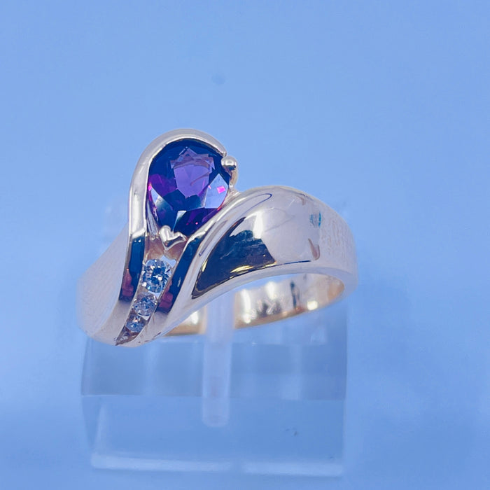 14kt Yellow Gold Garnet and 3 Diamond Ring