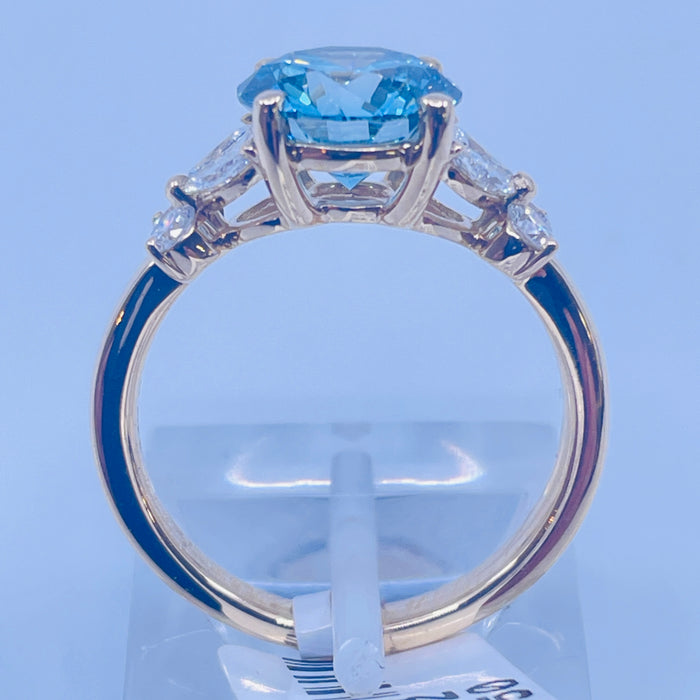 14kt Yellow Gold prong set 2.50ct Round lab grown Blue Diamond Engagement Ring with 8 side diamonds @.52ctw
