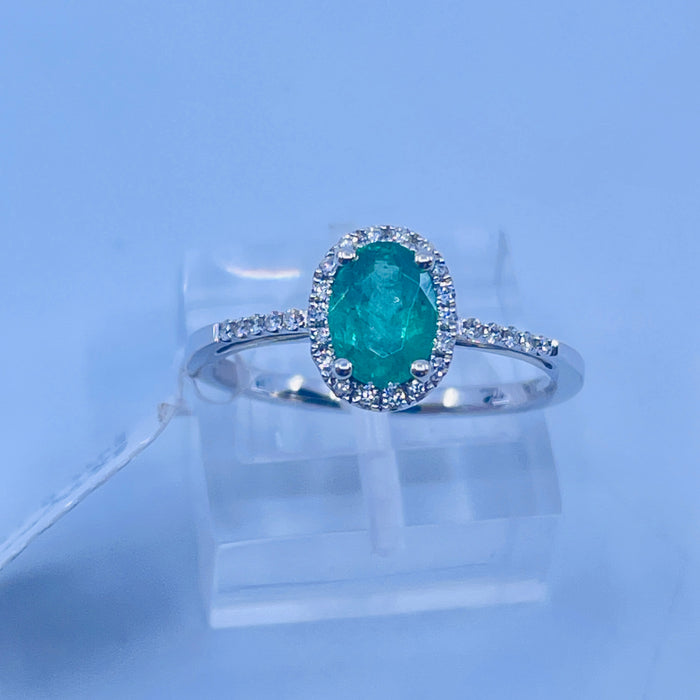 14kt White Gold Emerald and Diamond halo ring