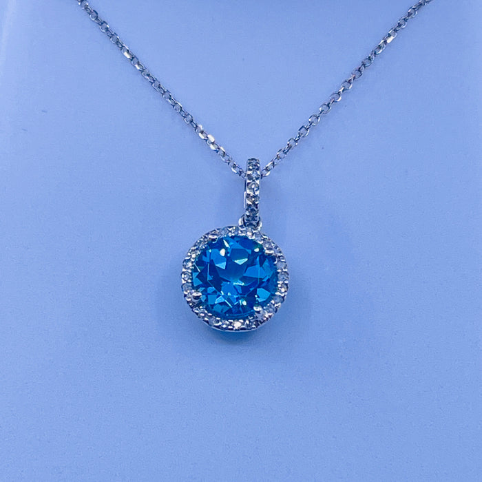 14kt White Gold Blue Topaz and Diamond Pendant