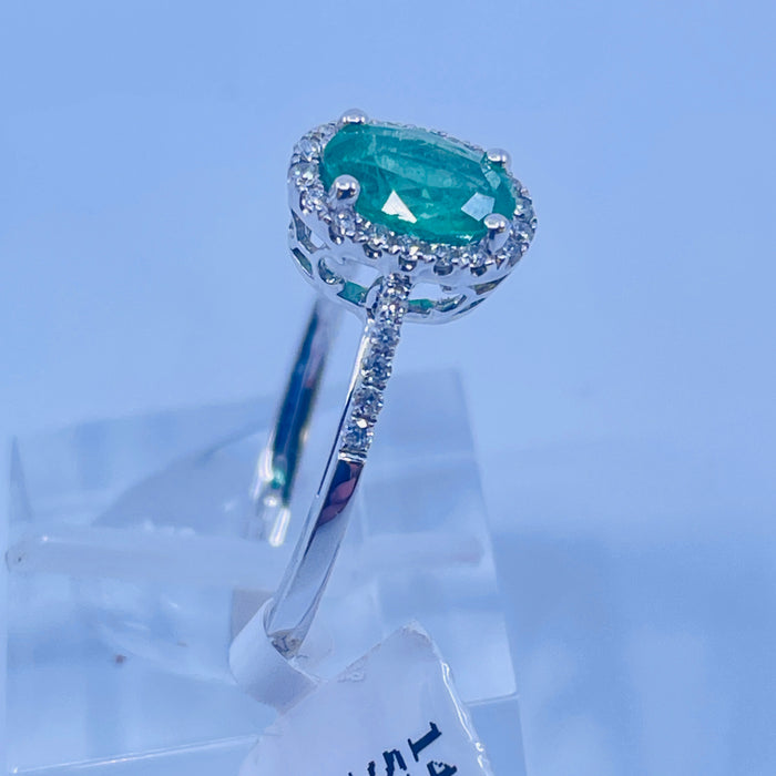 14kt White Gold Emerald and Diamond halo ring