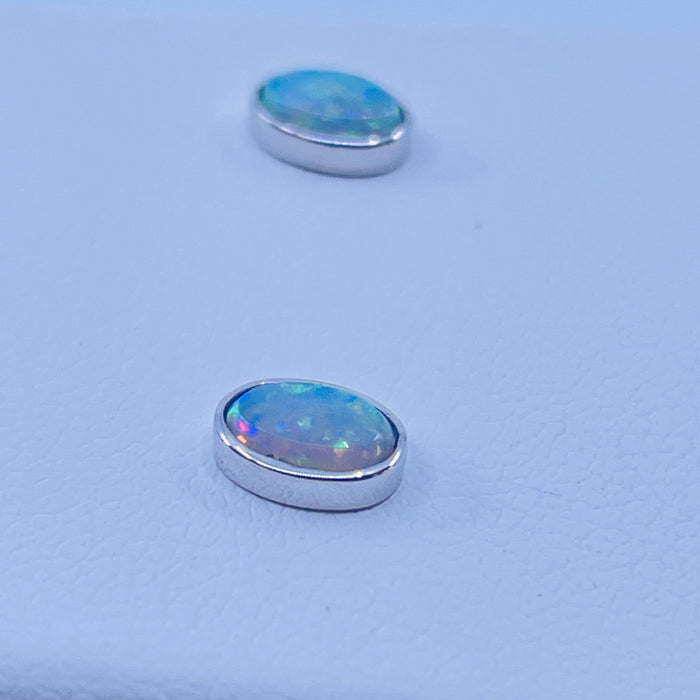 14kt White Gold bezel 4x6 stud Opal Earrings