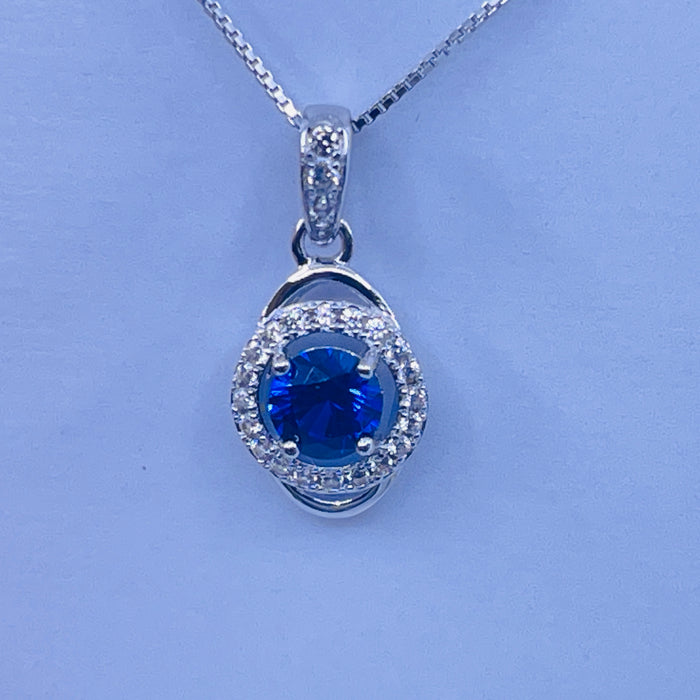 Sterling Silver Lab Sapphire Pendant with cz side stones