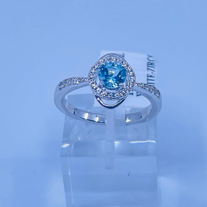 Sterling Silver Blue Topaz with cz side stones