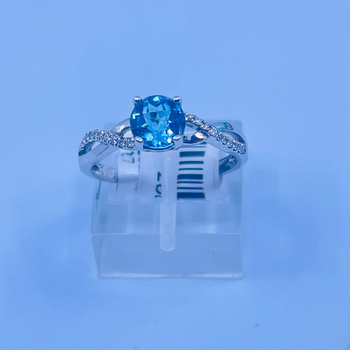 14kt White Gold 1.06ct Blue Topaz 20 Diamond Ring