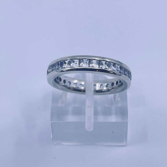 14kt White Gold White Topaz eternity band in size 5