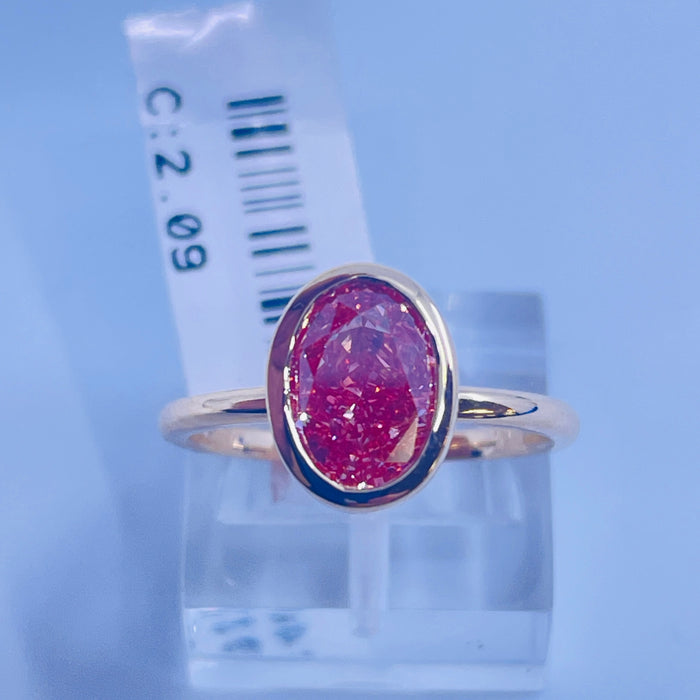 14kt Yellow Gold bevel set 2.09ct Oval lab grown Pink Diamond Solitaire