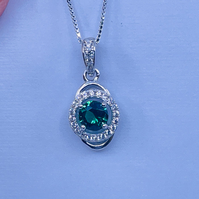 Sterling Silver Lab Emerald Pendant with cz side stones