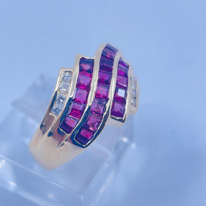 14kt Yellow Gold Ruby and Diamond bypass Ring