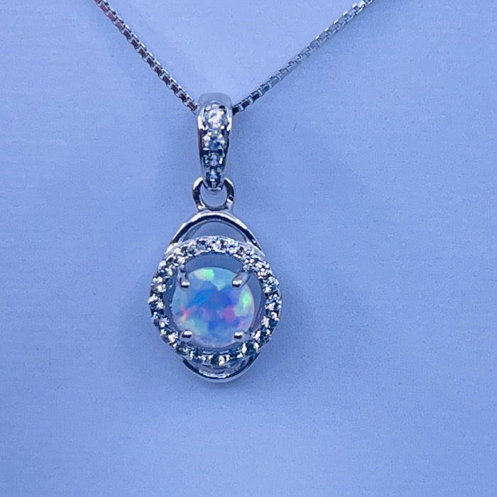 Sterling Silver Lab Opal Pendant with cz side stones