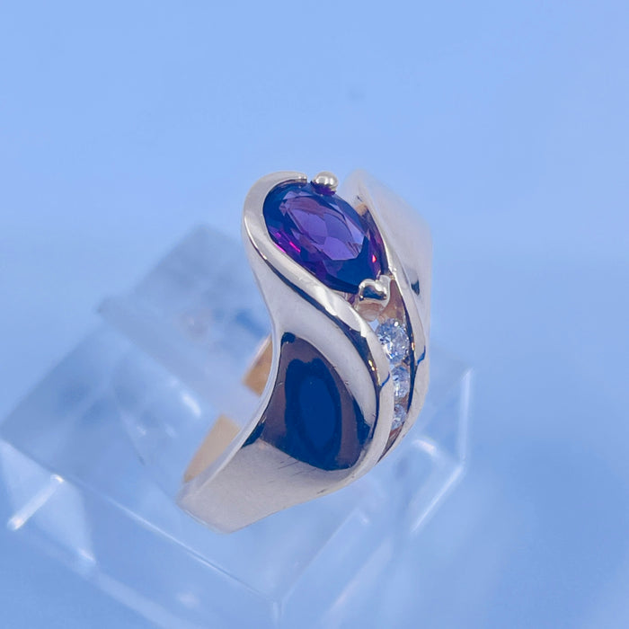 14kt Yellow Gold Garnet and 3 Diamond Ring