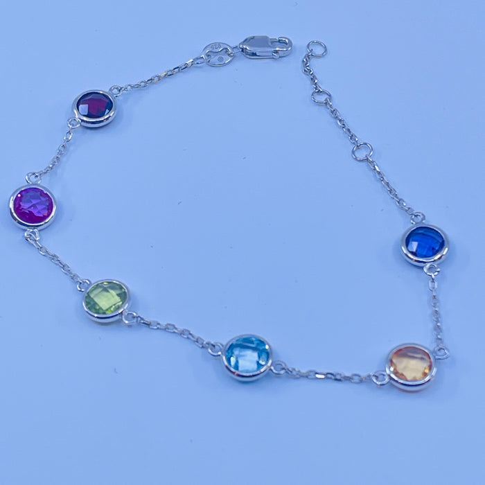 7” Sterling Silver Bracelet with 6 bezel set semi precious stones