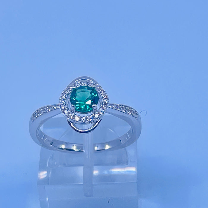 Sterling Silver Lab Emerald ring with cz side stones