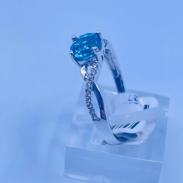 14kt White Gold 1.06ct Blue Topaz 20 Diamond Ring
