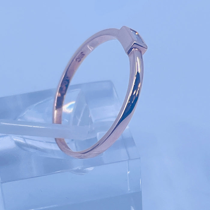 14kt Rose Gold .04ct Baguette diamond ring