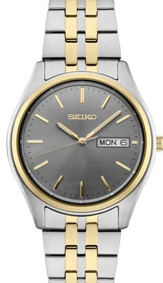 Gents Seiko crafted of stainless steel in versatile two-tone finish, this perfectly balanced watch features a Gray sunray dial with day/date calendar and sleek gold stick markers for a superb blend of clarity and style. 10 bar, 100M Water Resistant