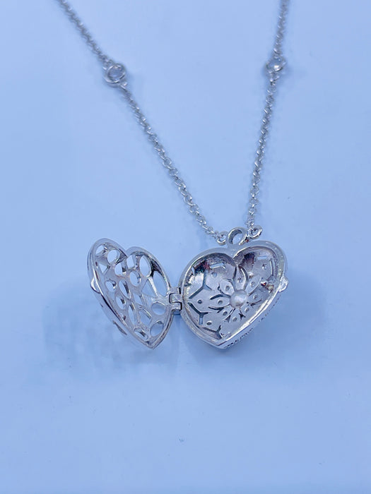 Sterling Silver pierced heart locket with Pearl