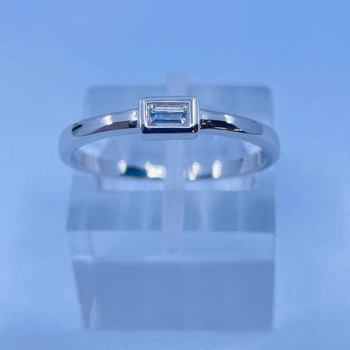 14kt White Gold .09ct Baguette shaped diamond Ring