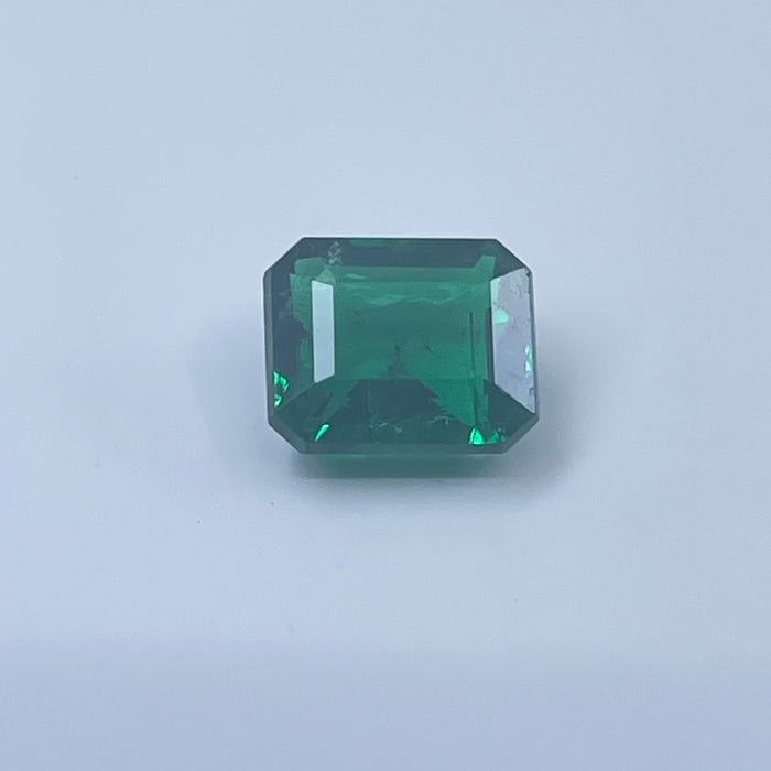 1.53ct  7.4 x 6.31mm Emerald set into a 14kt yellow gold mounting