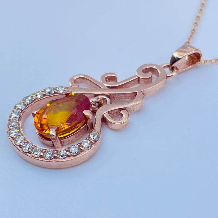 14kt Rose Gold 1.71ct Orange Sapphire and .22ctw Diamond Pendant