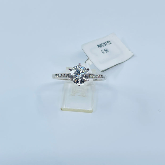 14kt White Gold 1.01ct I I1 in a .12ctw channel mounting