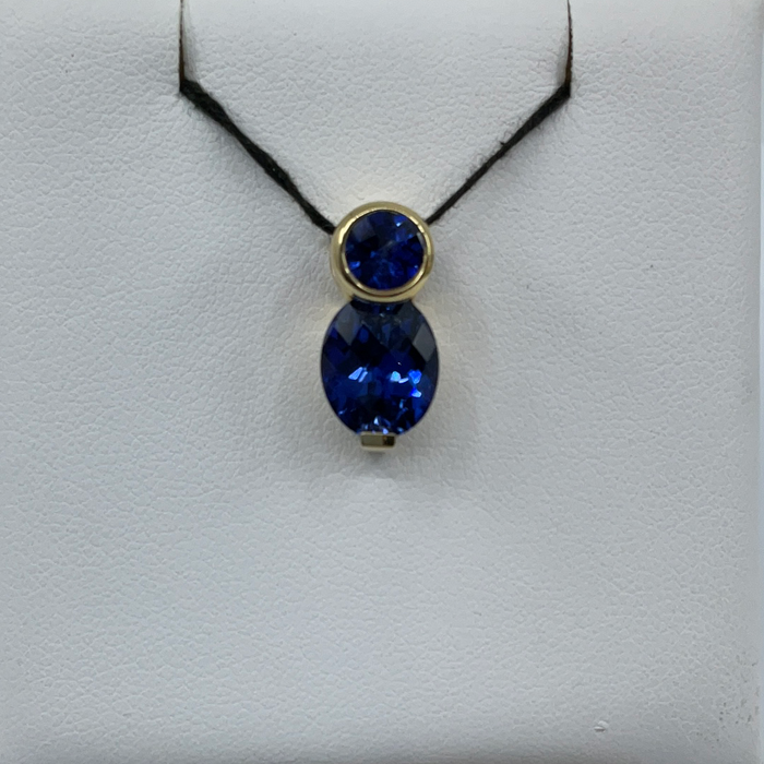 14kt Yellow Gold lab created blue Sapphire pendant