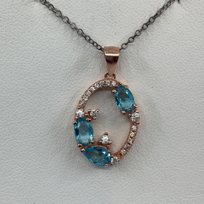 Sterling silver Rose plated Blue Topaz and CZ Pendant