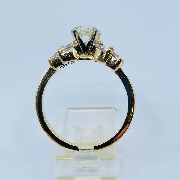 14kt Yellow Gold .81ct K SI1 OE center, 8 Marquise mounting