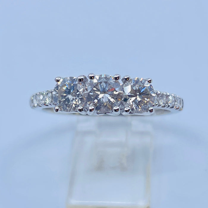 14kt White Gold Three stone ring with side diamonds