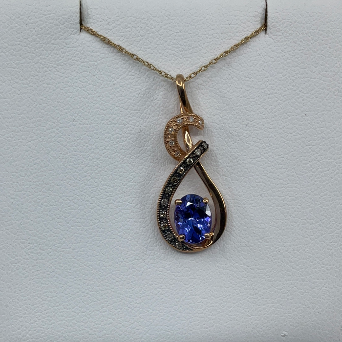 10kt Rose gold Tanzanite and .10ctw diamond pendant