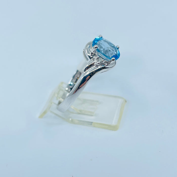 14kt White Gold Blue Topaz and diamond ring