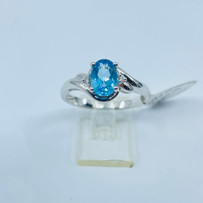 14kt White Gold Blue Topaz and diamond ring