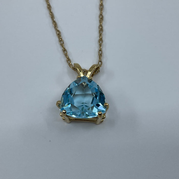 14kt yellow gold trillion cut Blue Topaz pendant