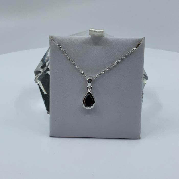 Rhodium finish January birthstone teardrop CZ pendant