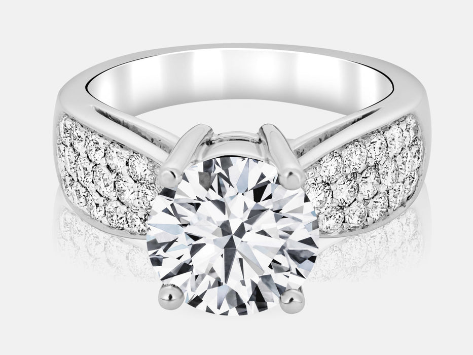 14kt White Gold Set with 32 round brilliant diamonds totaling 0.75 carats.