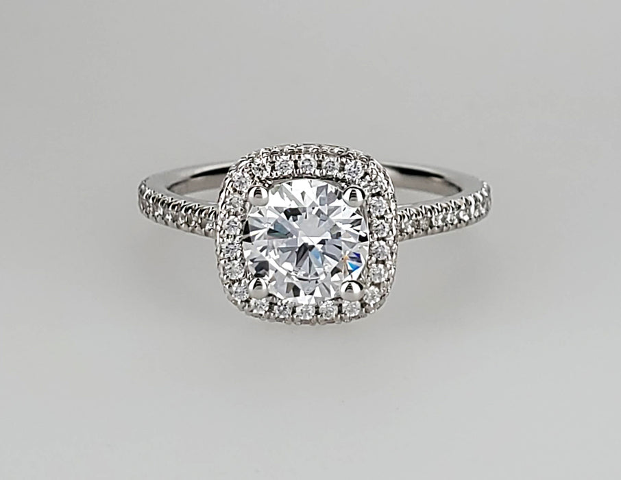 Double-sided halo with 76 diamonds with a straight diamond shank mounting