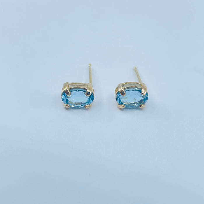 14kt Yellow Gold oval Blue Topaz earrings