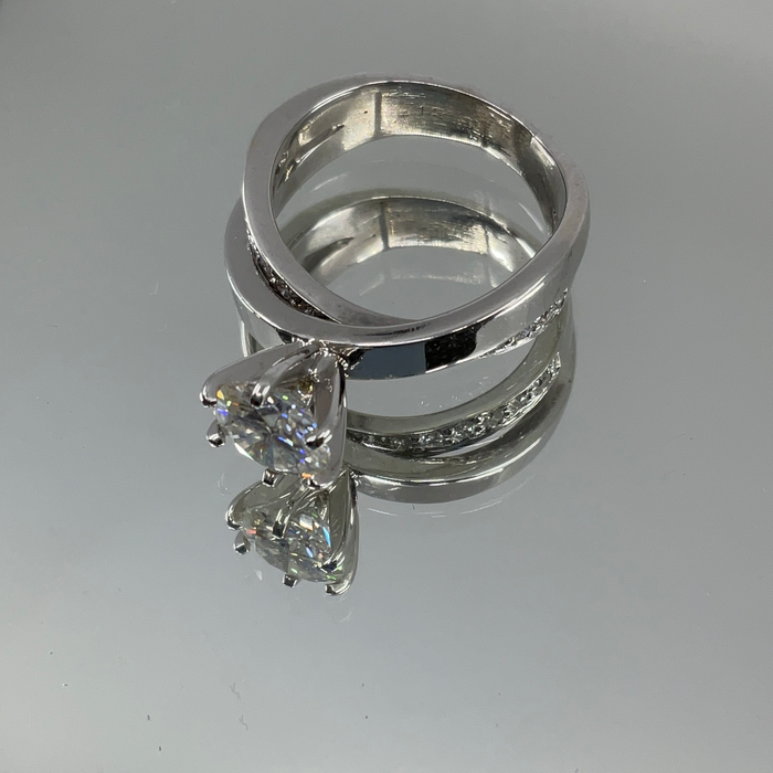 14kt White Gold Ring with 7mm Moissanite center with diamond side stones