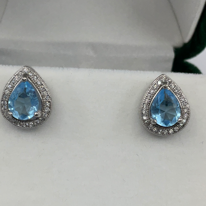Sterling Silver Teardrop Simulated Blue Topaz with CZ Border Earrings