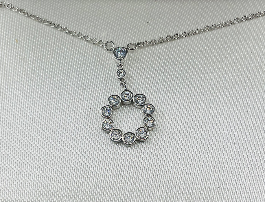 Rhodium Finish Small Circle CZ Pendant on 18" Chain