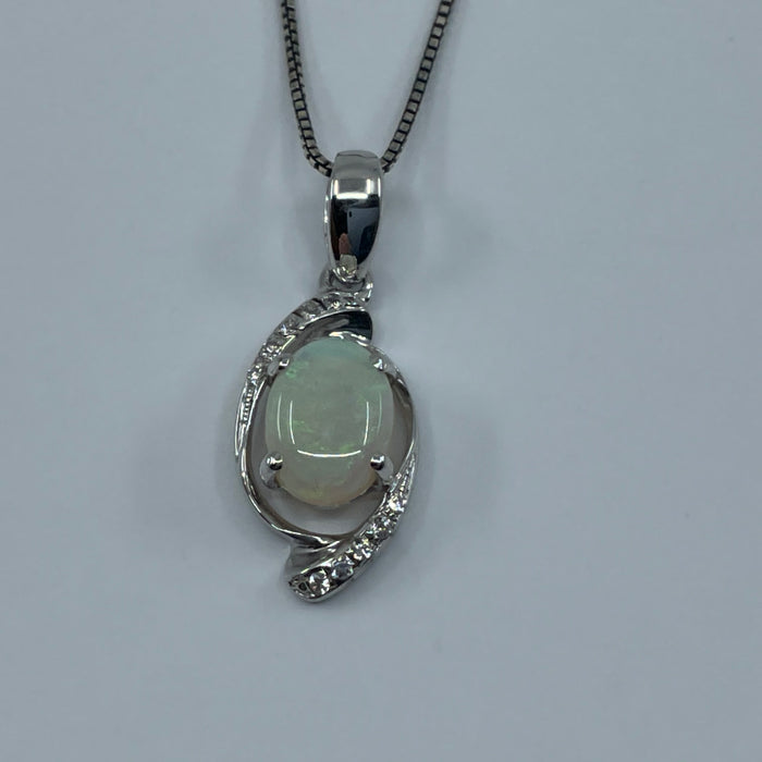 Silver Opal and diamond pendant